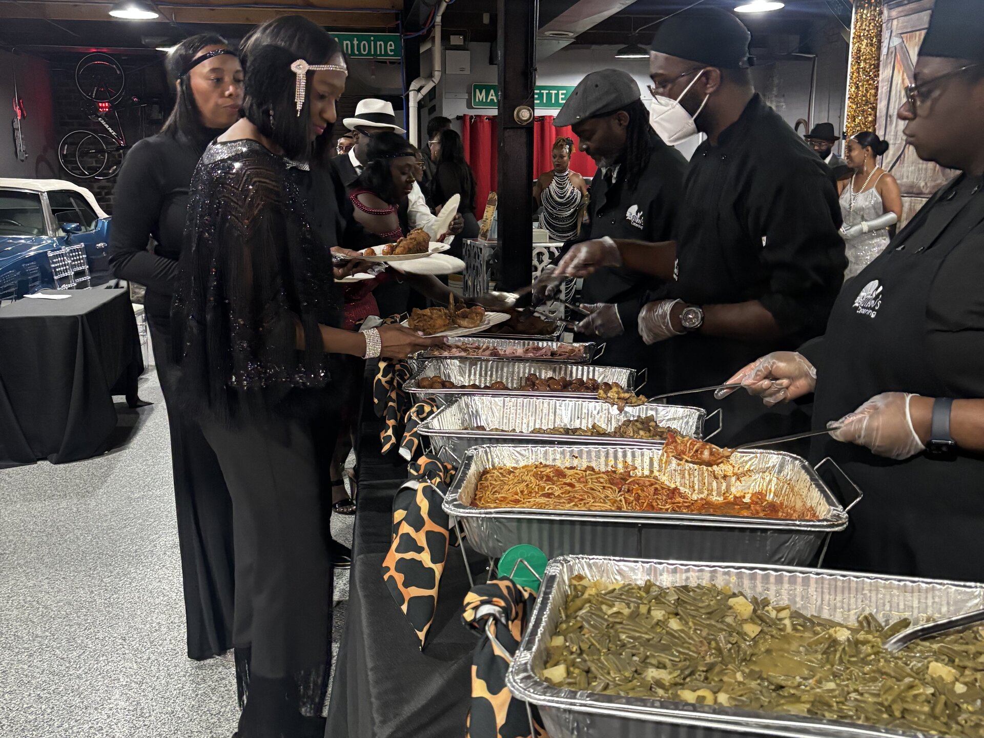 Guests being served at a DeMarv's Catering event