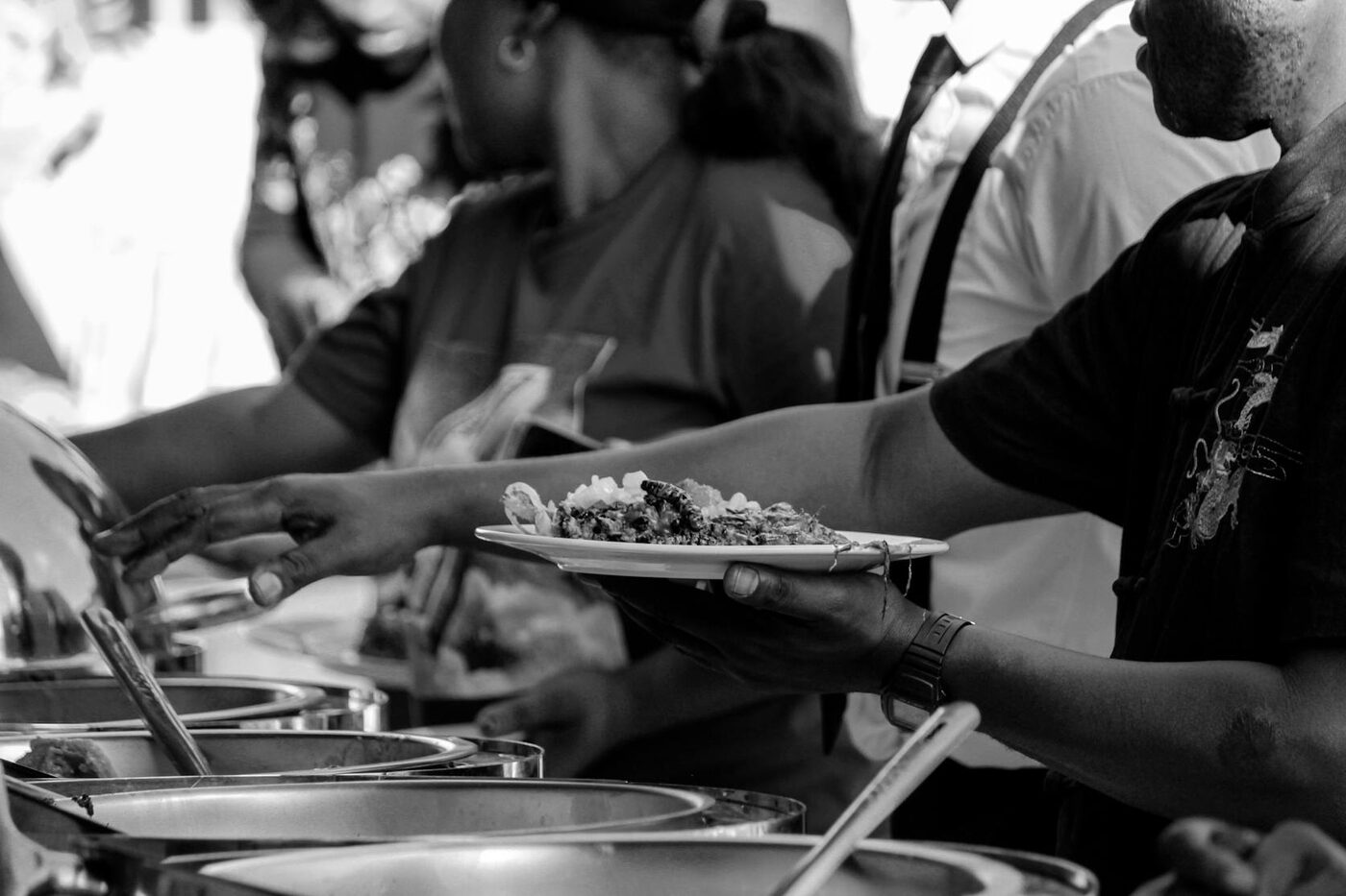 Guests being served plated food